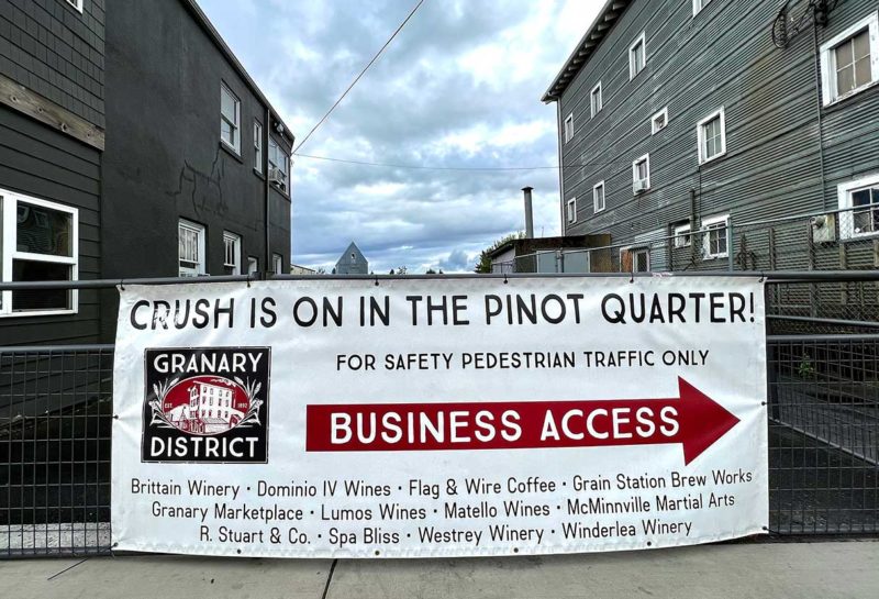 Sign pointing to the R. Stuart & Co Winery located in the Granary District of McMinnville