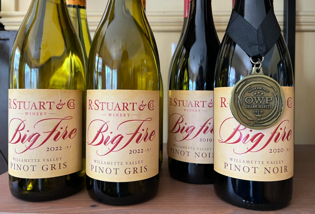 Bottles of R. Stuart 2022 Big Fire Pinot Gris and Pinot Noir