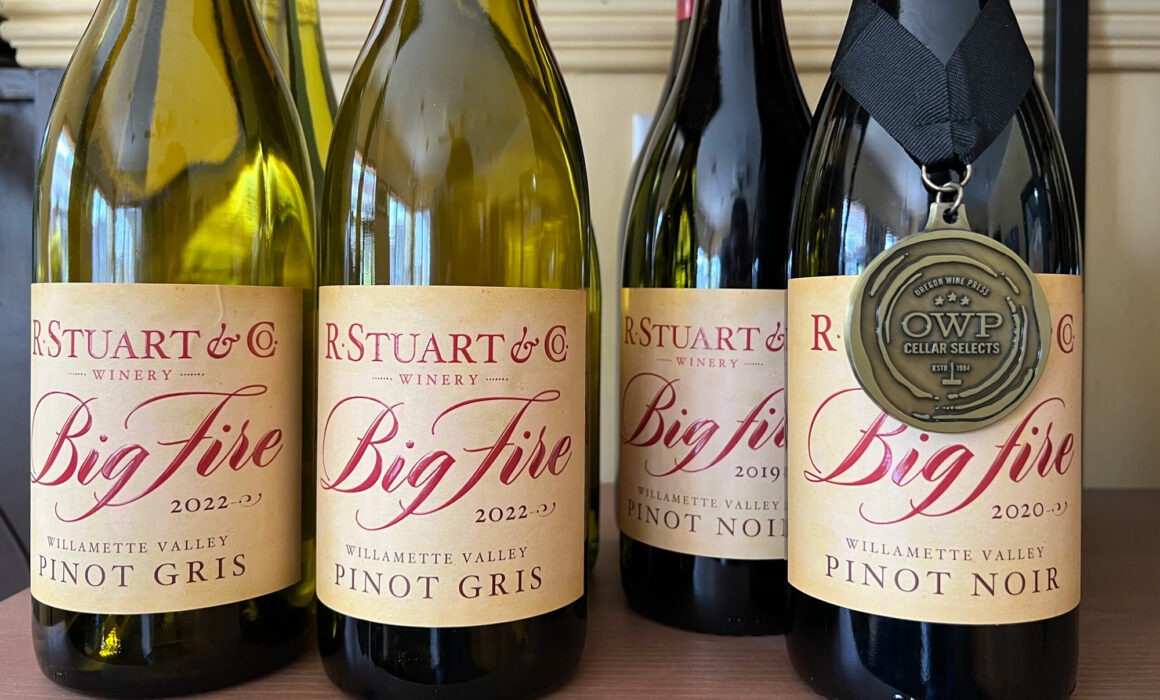 Bottles of R. Stuart 2022 Big Fire Pinot Gris and Pinot Noir